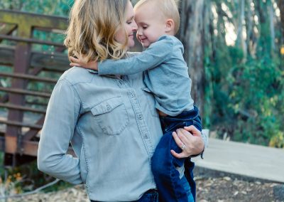 Mom holding two year old son | san diego family photographer | Book today, visit www.babiesandbeauties.com