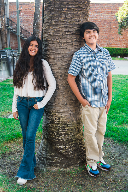 Brother and sister photo in front of palm tree | family photography san diego | www.babiesandbeauties.com